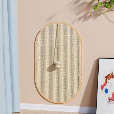 griffoir chat ovale sur un mur